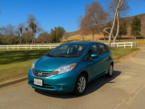 354182 primary 2015 nissan versa note s plus hatchback 1024x683 1.jpg